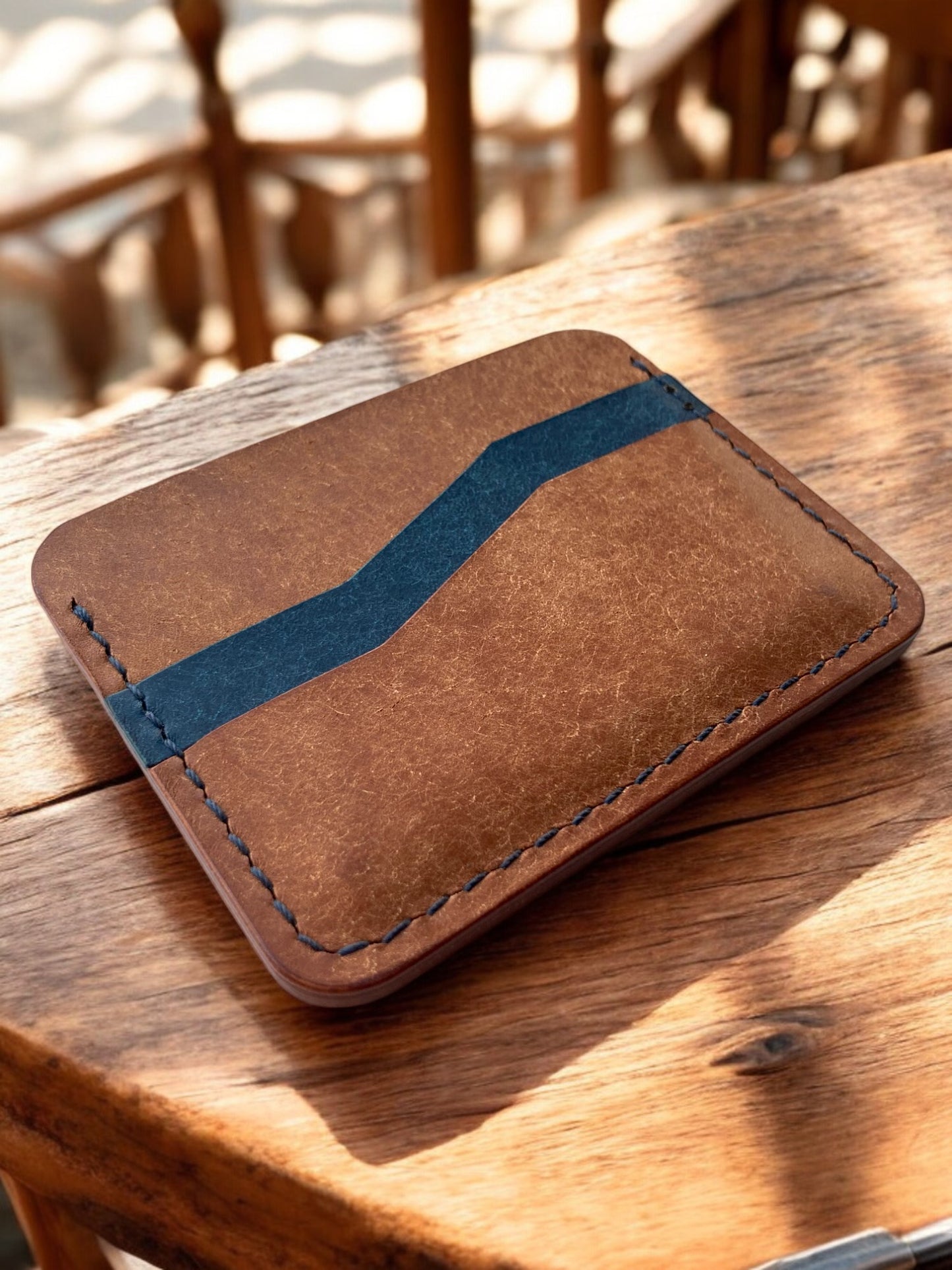 Arkos lederen kaarthouder in cognac en blauw